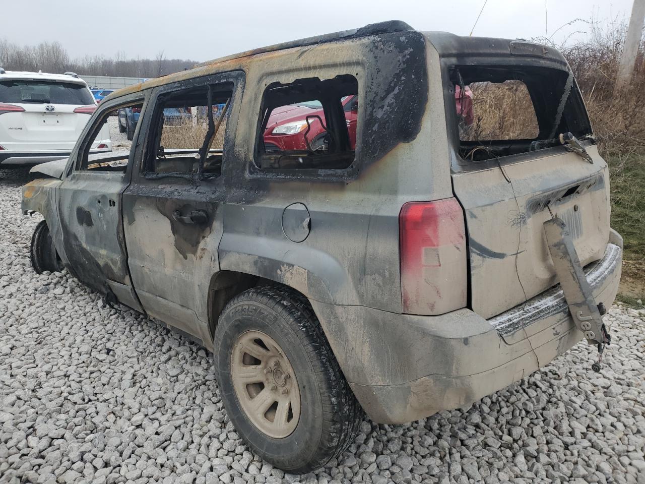 2011 Jeep Liberty (Patriot) VIN 1J4NT1GB3BD229434 Copart auction photo, burn damage thumbnail 2