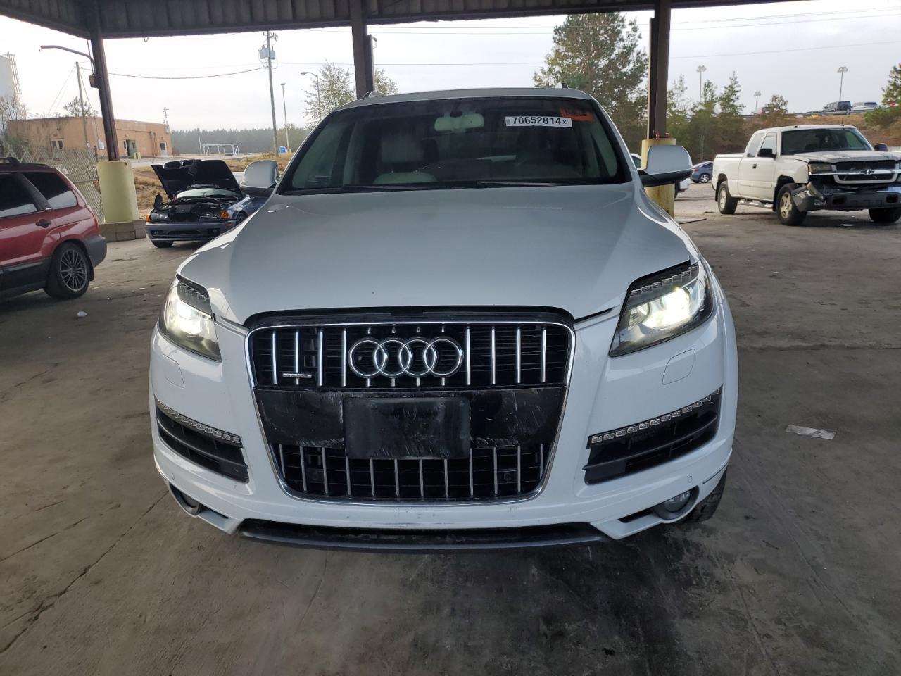 2015 Audi Q7 VIN WA1LGAFE6FD025854 Copart auction photo, side / front end damage thumbnail 5