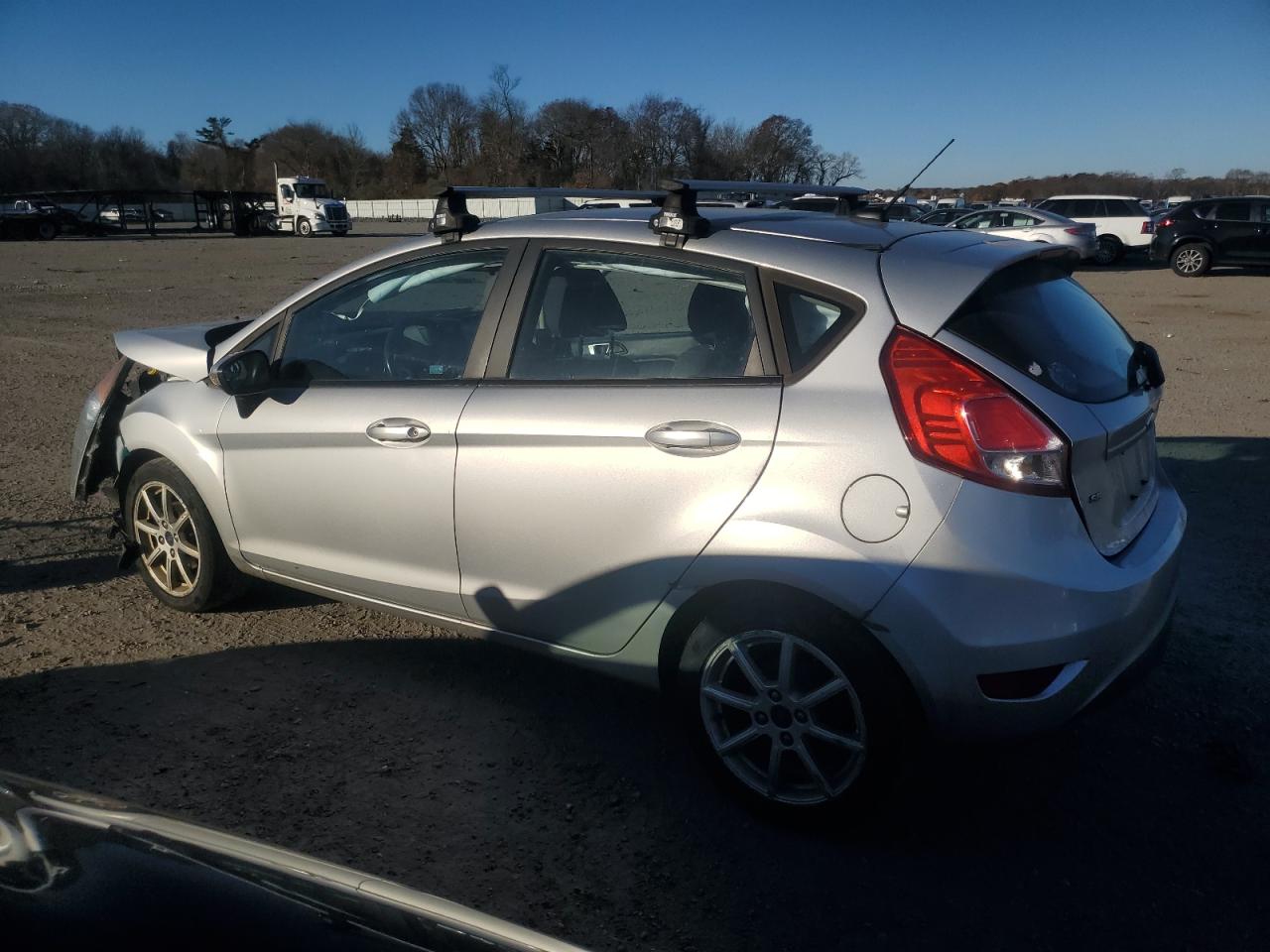 2015 Ford Fiesta VIN 3FADP4EJ9FM210484 Copart auction photo, front end / minor dent/scratches damage thumbnail 2