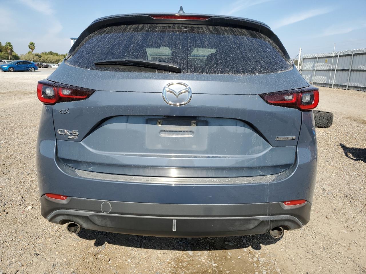 2023 Mazda CX-5 VIN JM3KFBCM6P0144672 Copart auction photo, front end / minor dent/scratches damage thumbnail 6