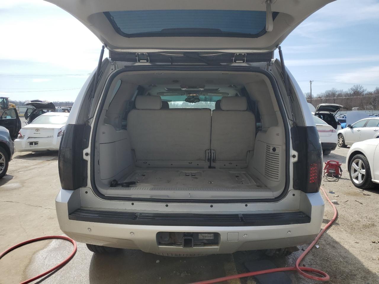 2010 Chevrolet Tahoe VIN 1GNUKBE06AR260827 Copart auction photo, water/flood damage thumbnail 6
