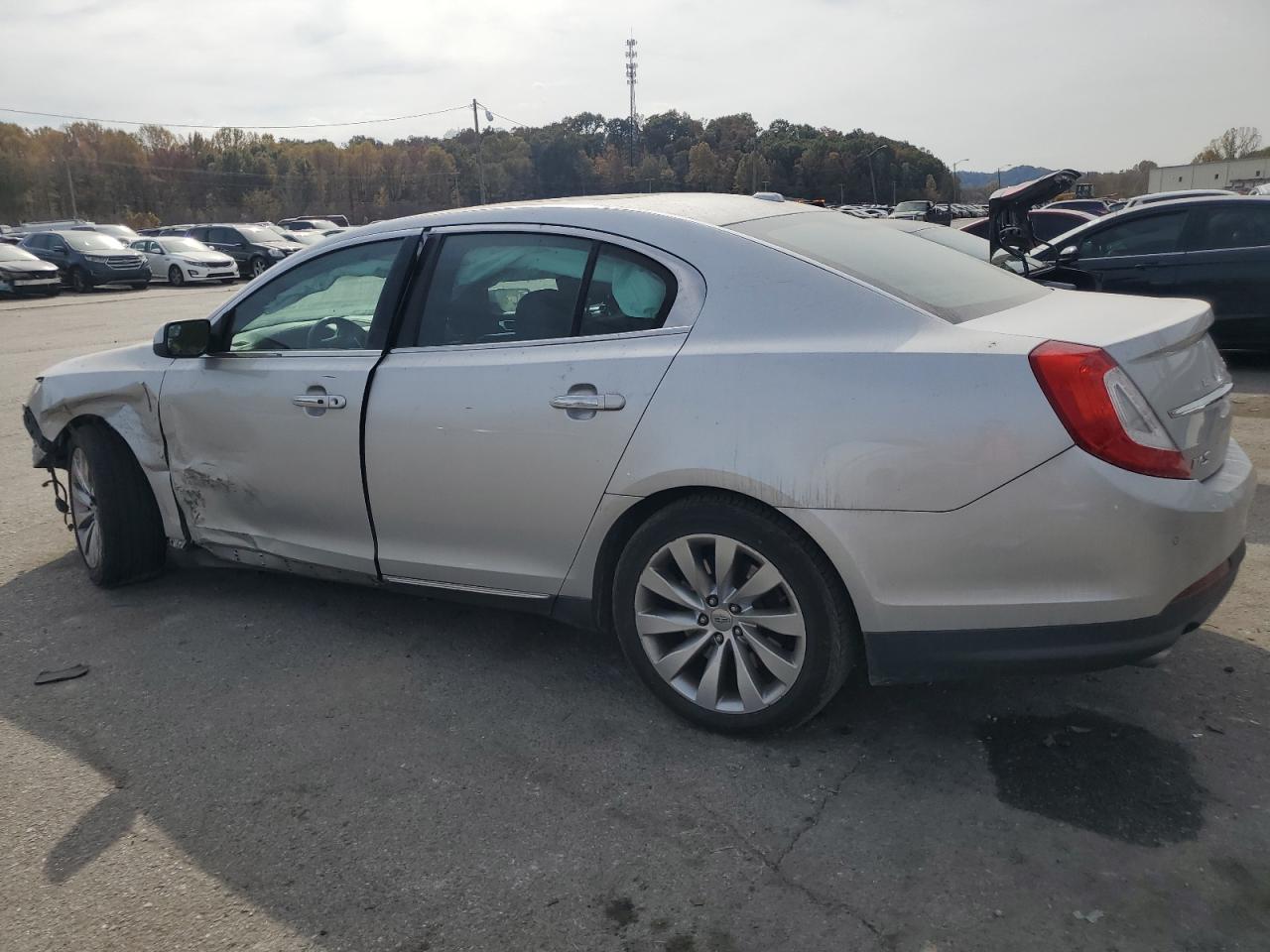 2016 Lincoln MKS VIN 1LNHL9DK4GG601869 Copart auction photo, front end / side damage thumbnail 2