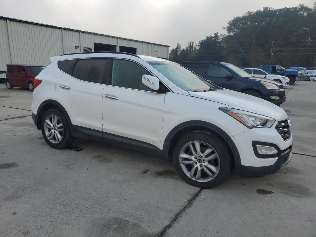 2013 Hyundai Santa Fe VIN 5XYZUDLAXDG071276 Copart auction photo, front end damage thumbnail 4