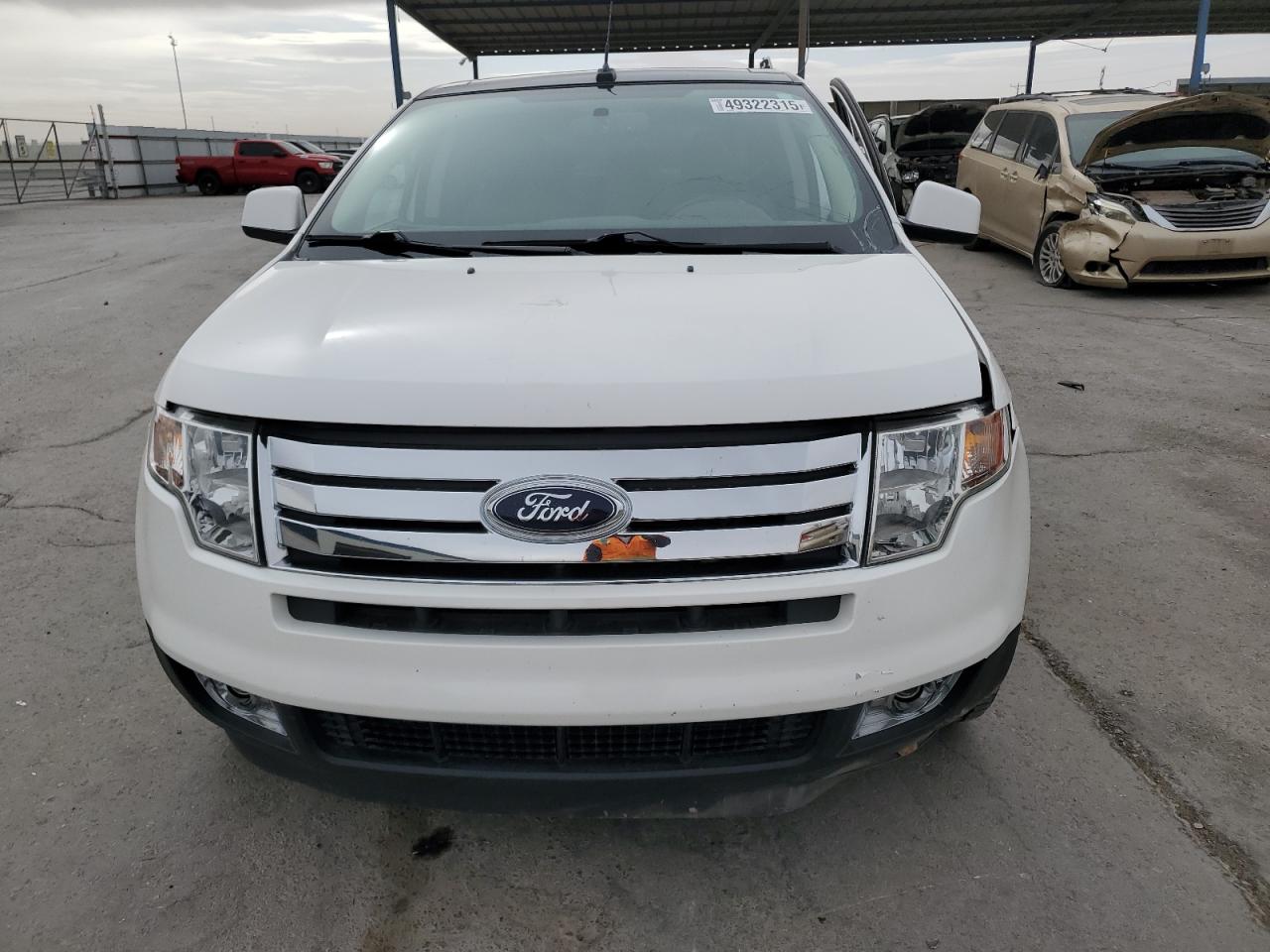 2010 Ford Edge VIN 2FMDK4KC5ABA04356 Copart auction photo, side / front end damage thumbnail 5