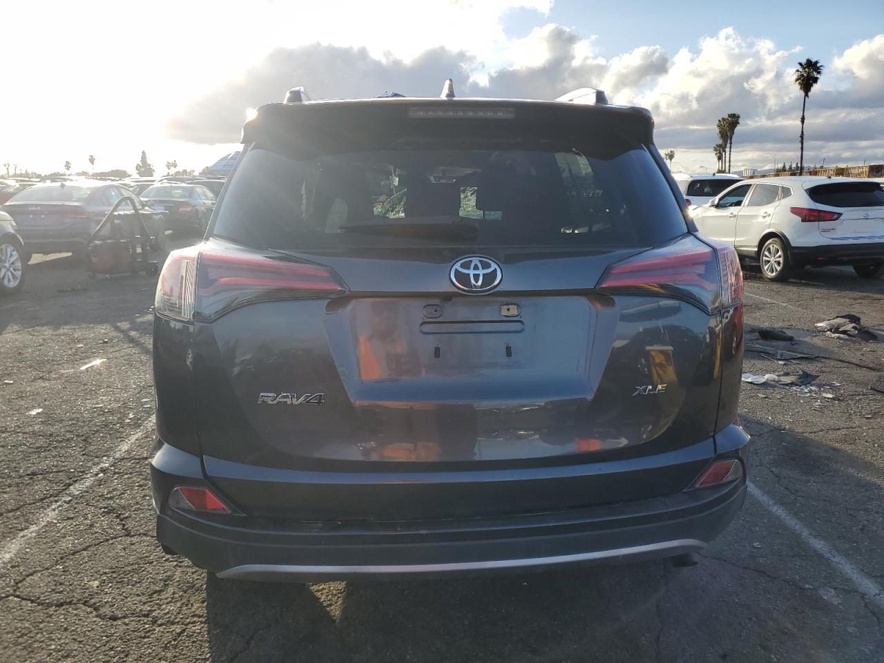 2018 Toyota RAV 4 VIN JTMWFREV4JJ745864 Copart auction photo, rollover damage thumbnail 6