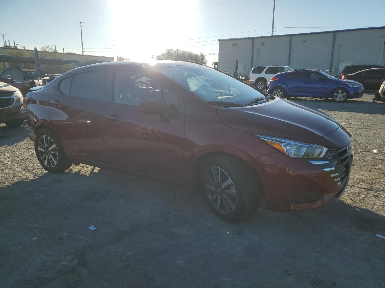 2024 Nissan Versa VIN 3N1CN8EV2RL866612 Copart auction photo, side / rear end damage thumbnail 4