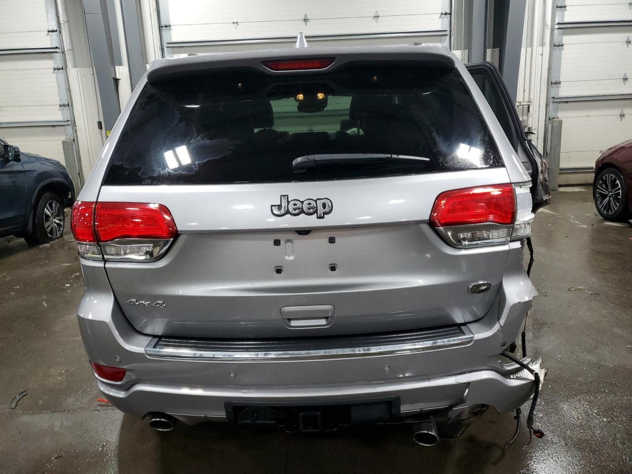 2017 Jeep Grand Cherokee VIN 1C4RJFCG8HC608245 Copart auction photo, rear end / side damage thumbnail 6