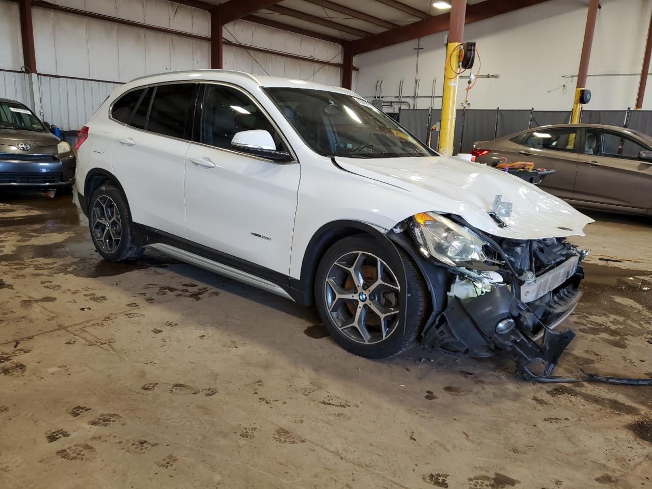 2017 BMW X1 VIN WBXHT3C36H5F76388 Copart auction photo, front end / side damage thumbnail 4