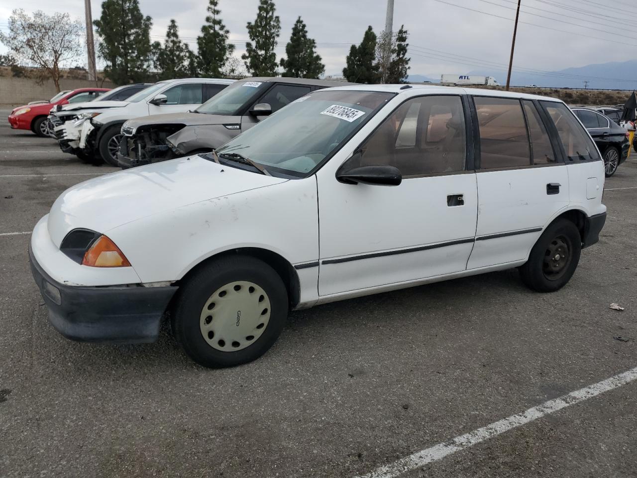1993 GEO Metro VIN 2C1MR6469P6700123 - Copart auction photo