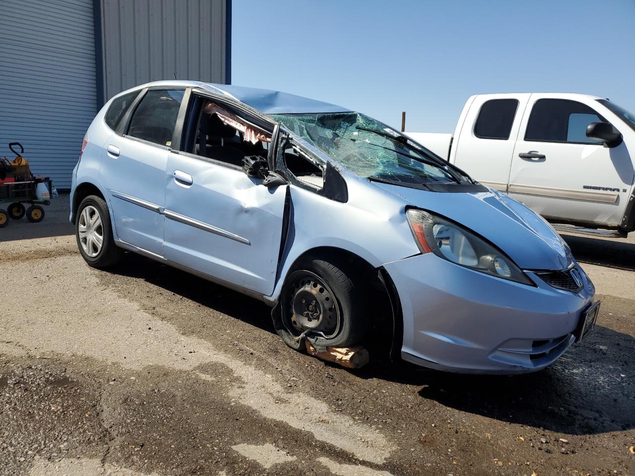 2010 Honda Fit VIN JHMGE8H2XAC037575 Copart auction photo, rollover damage thumbnail 4