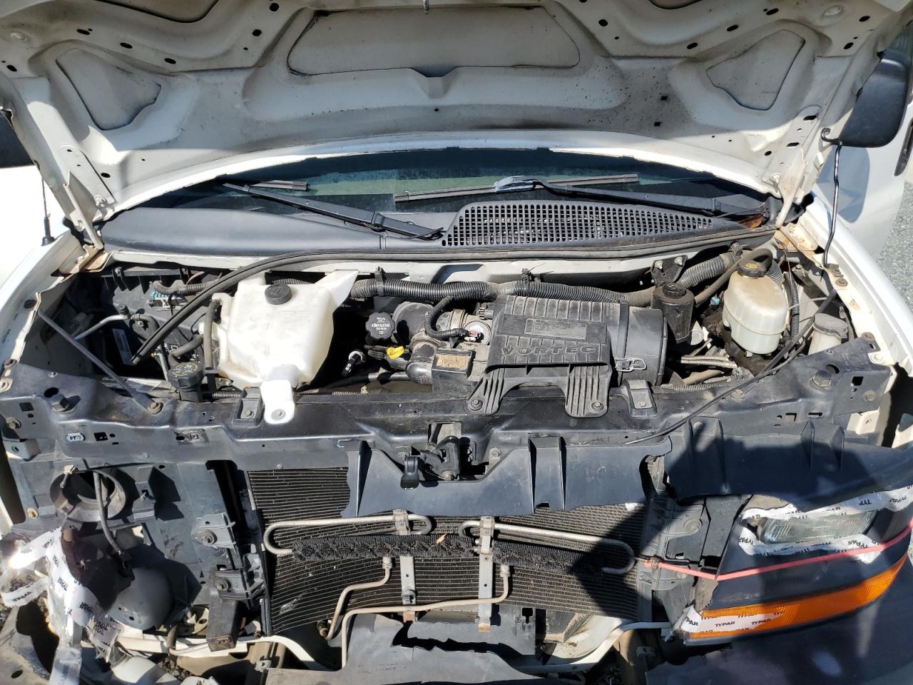 2014 Chevrolet Express VIN 1GCWGFCA0E1140371 Copart auction photo, all over damage thumbnail 14