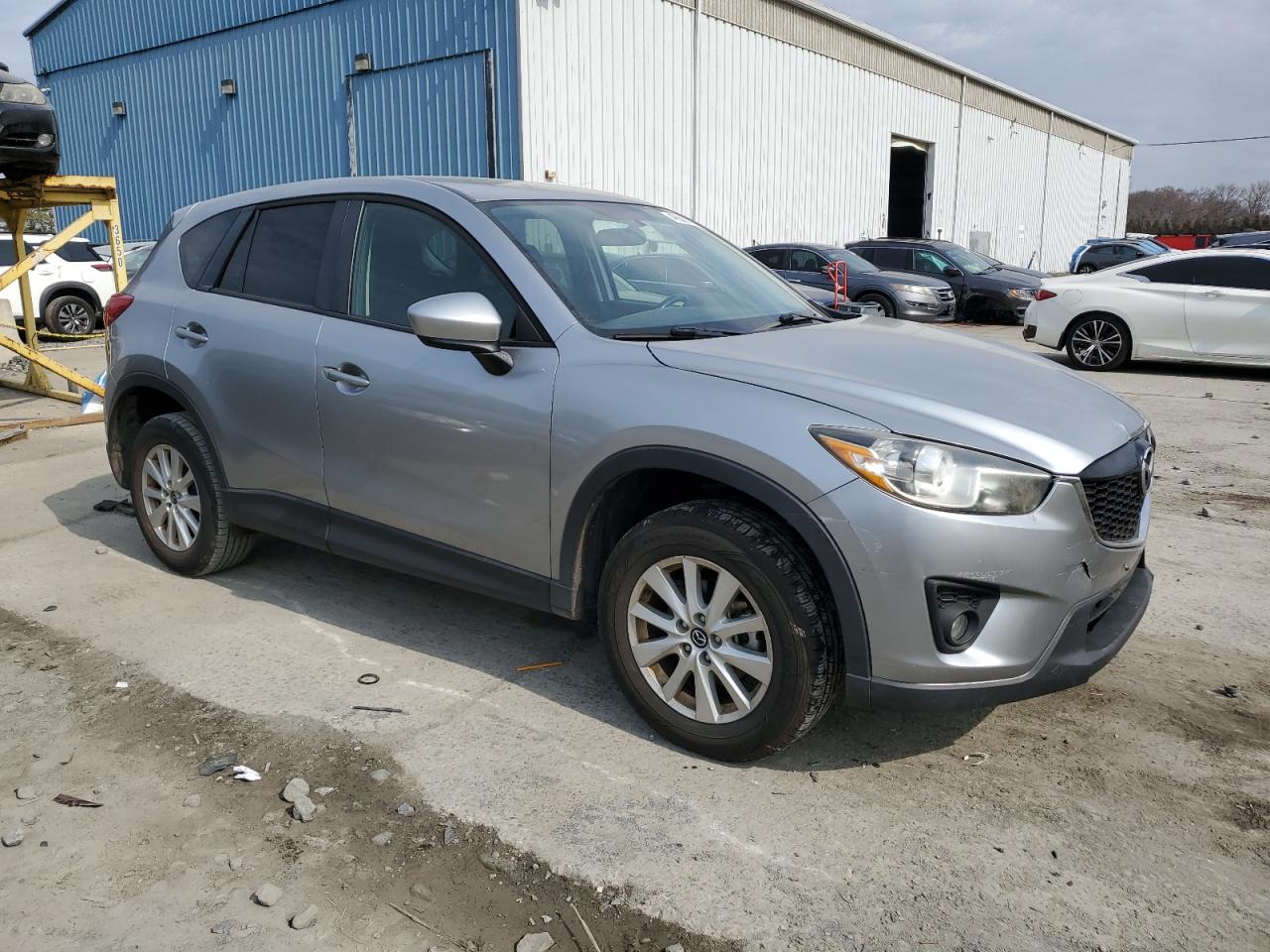 2013 Mazda CX-5 VIN JM3KE4CE9D0101477 Copart auction photo, rear end / minor dent/scratches damage thumbnail 4