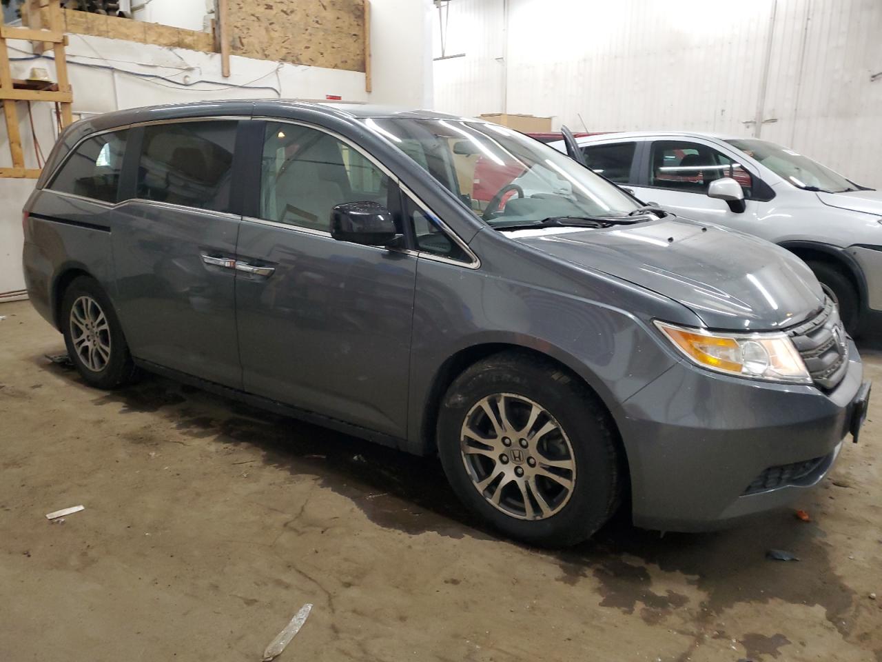2012 Honda Odyssey VIN 5FNRL5H4XCB100809 Copart auction photo, front end / side damage thumbnail 4