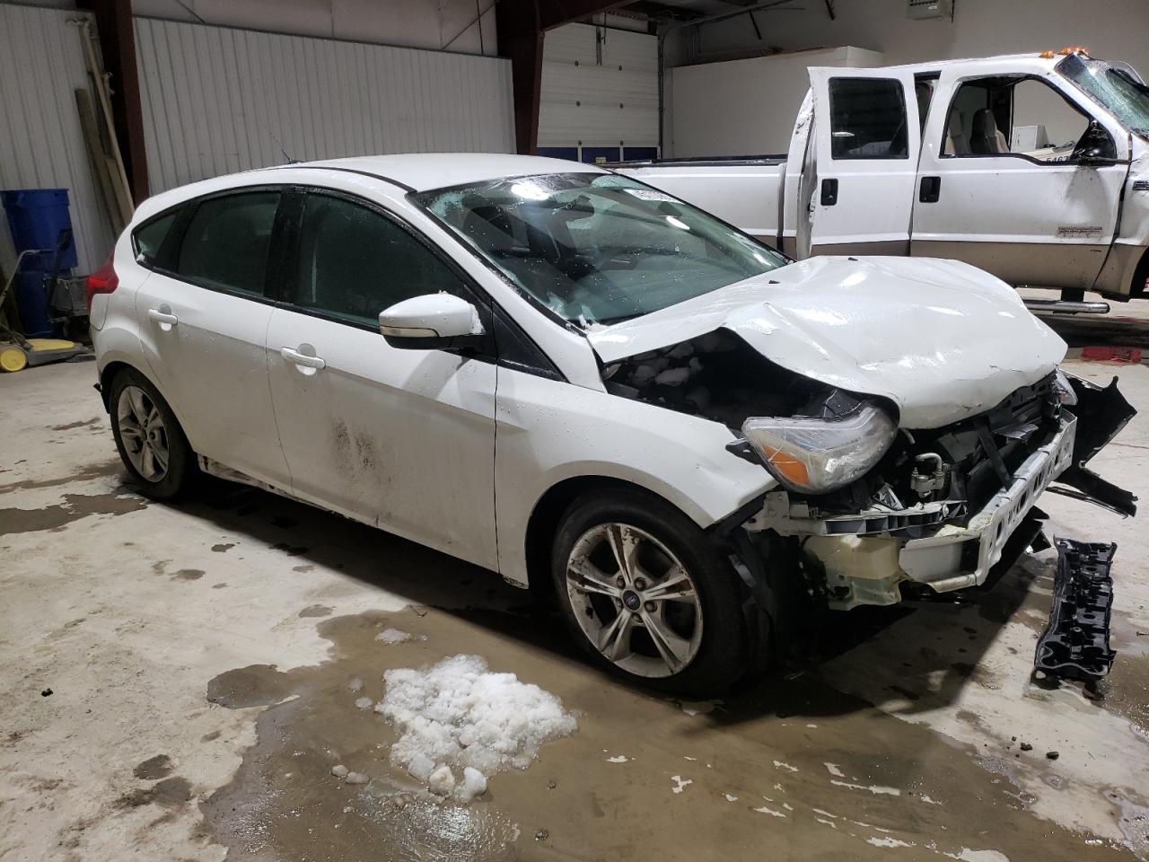 2014 Ford Focus VIN 1FADP3K2XEL232257 Copart auction photo, front end / rear end damage thumbnail 4