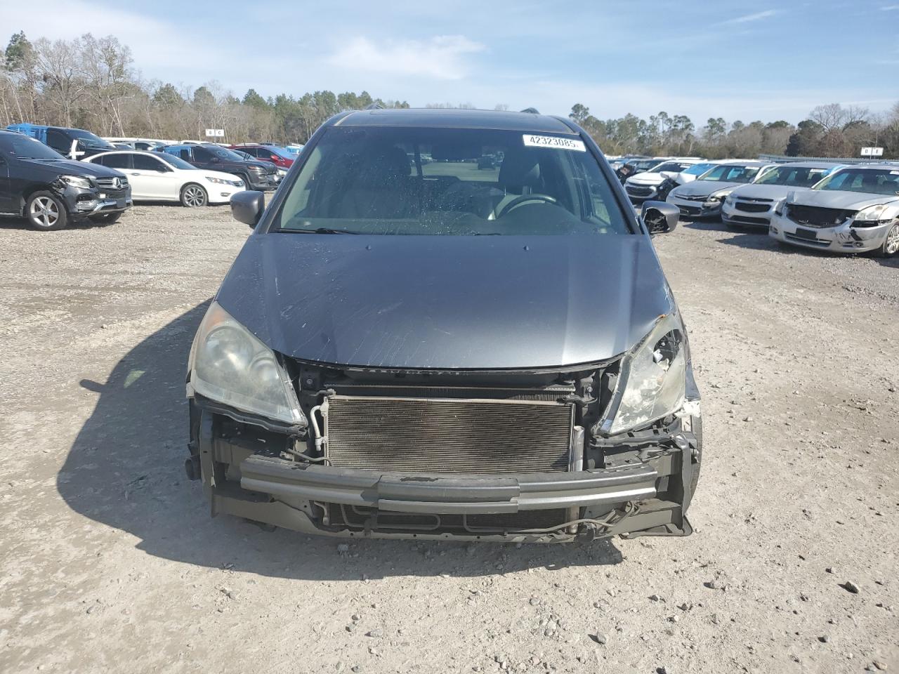 2010 Honda Odyssey VIN 5FNRL3H6XAB011325 Copart auction photo, front end / side damage thumbnail 5