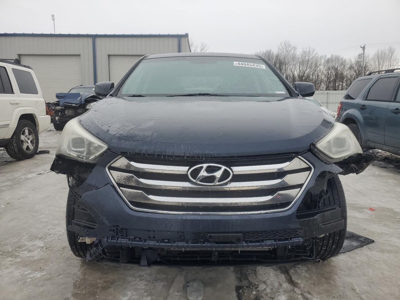 2013 Hyundai Santa Fe VIN 5XYZTDLB8DG028213 Copart auction photo, front end / side damage thumbnail 5