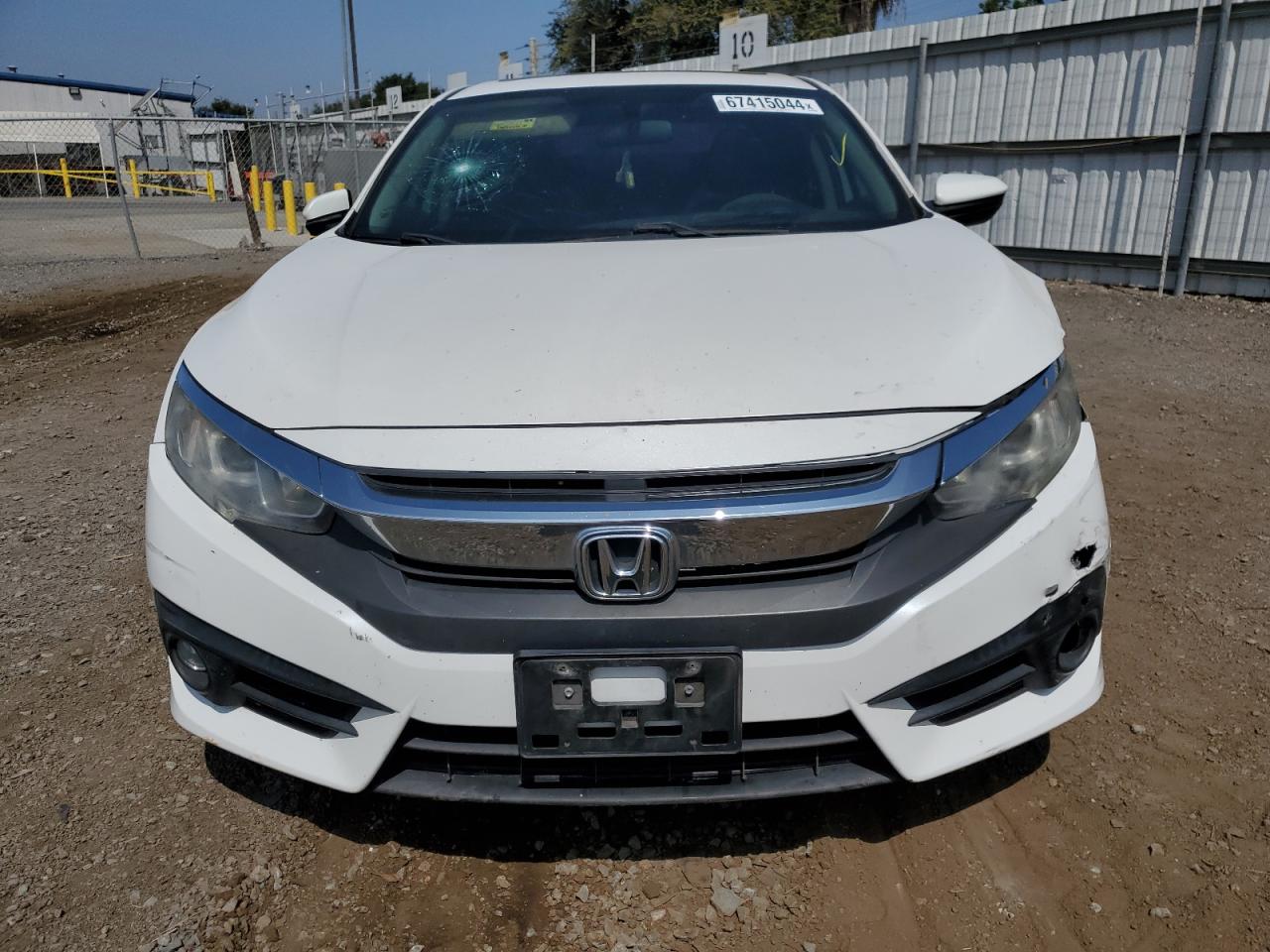 2016 Honda Civic VIN 19XFC1F34GE223457 Copart auction photo, all over damage thumbnail 5