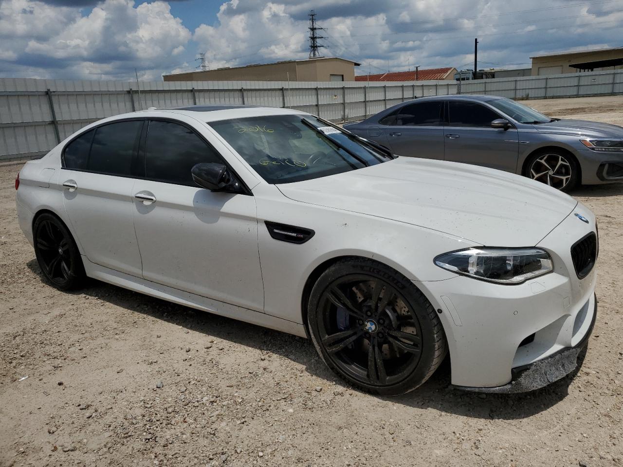 2016 BMW M5 VIN WBSFV9C59GD595692 Copart auction photo, water/flood damage thumbnail 4