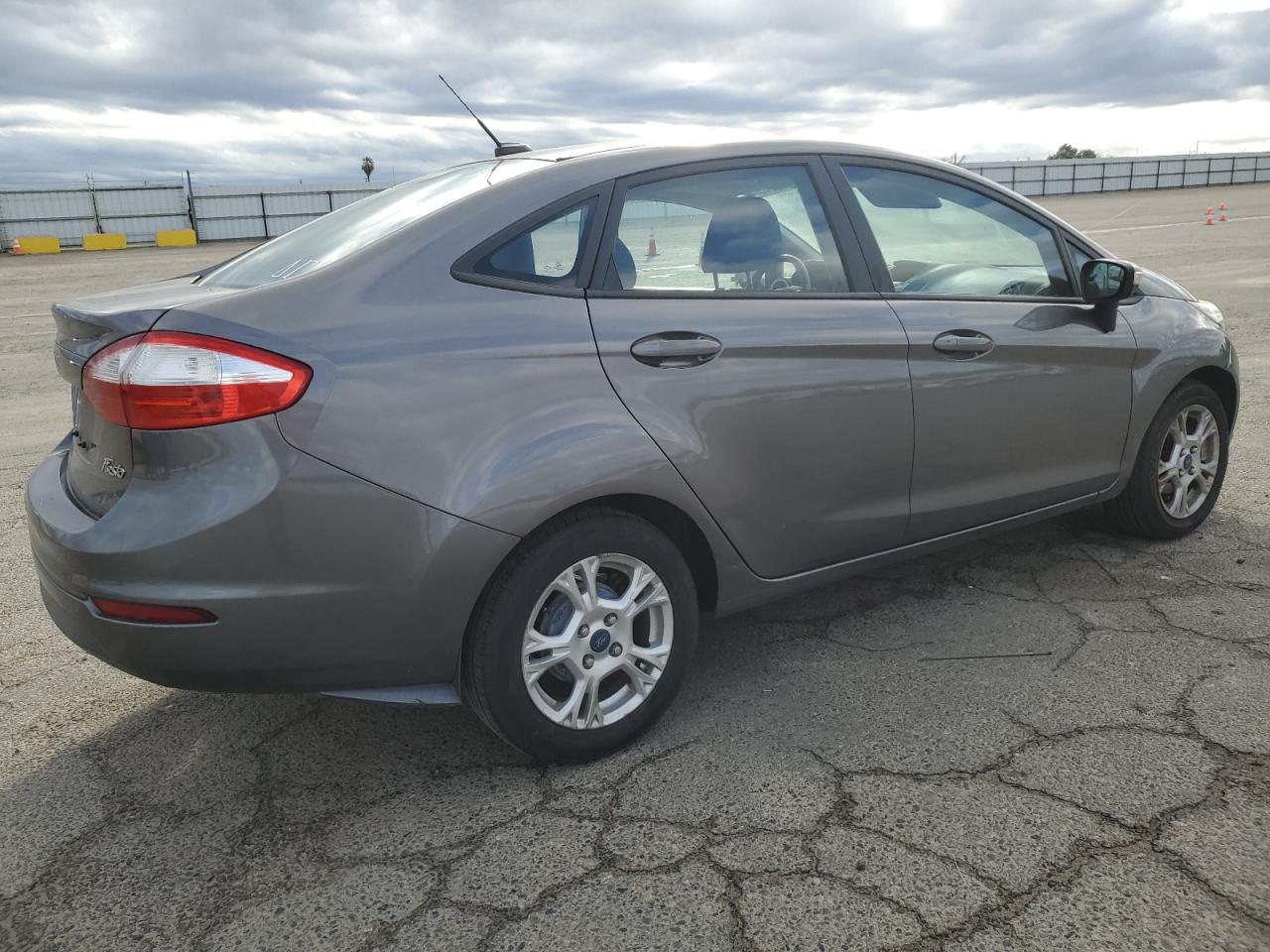 2014 Ford Fiesta VIN 3FADP4BJ9EM160429 Copart auction photo, side / front end damage thumbnail 3