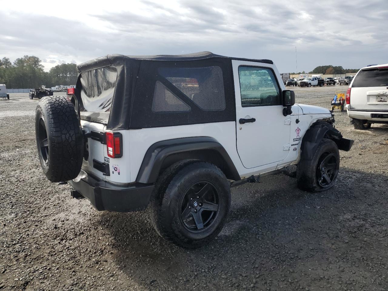 2015 Jeep Wrangler VIN 1C4AJWAG6FL502292 Copart auction photo, all over damage thumbnail 3