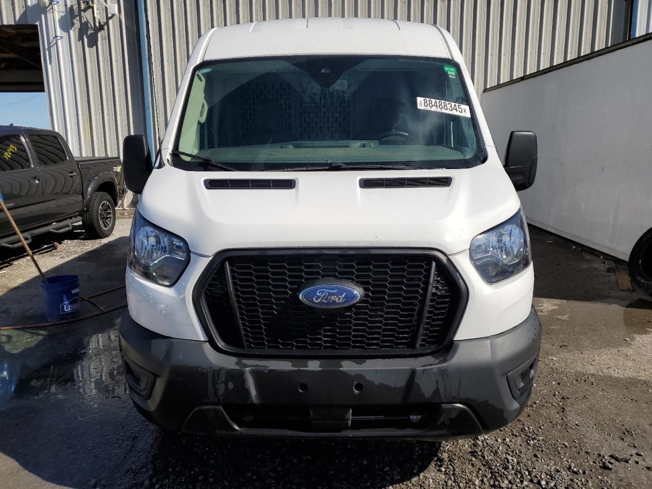 2023 Ford Transit VIN 1FTBR1C80PKA79920 Copart auction photo, water/flood damage thumbnail 5