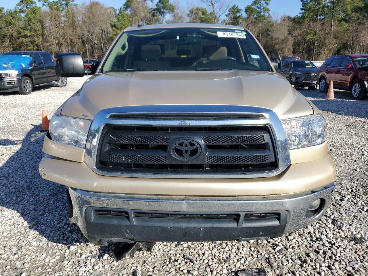 2010 Toyota Tundra VIN 5TFDW5F15AX130815 Copart auction photo, side / front end damage thumbnail 5