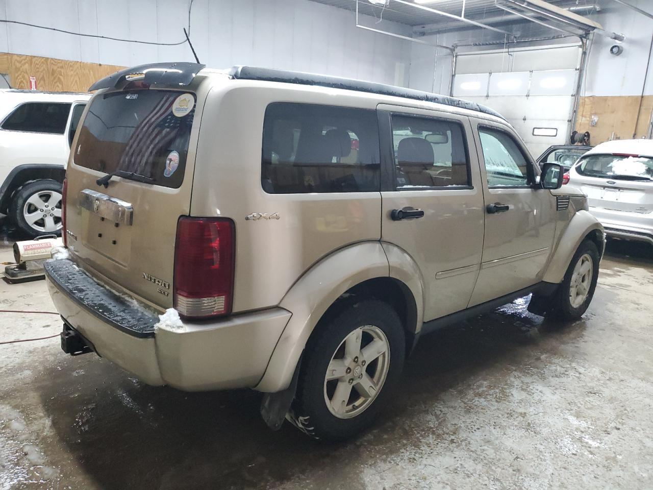 2010 Dodge Nitro VIN 1D4PU5GK8AW124381 Copart auction photo, front end / minor dent/scratches damage thumbnail 3