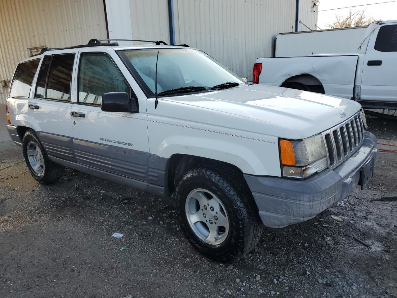 1997 Jeep Grand Cherokee VIN 1J4FX58S2VC612449 Copart auction photo, rear end damage thumbnail 4