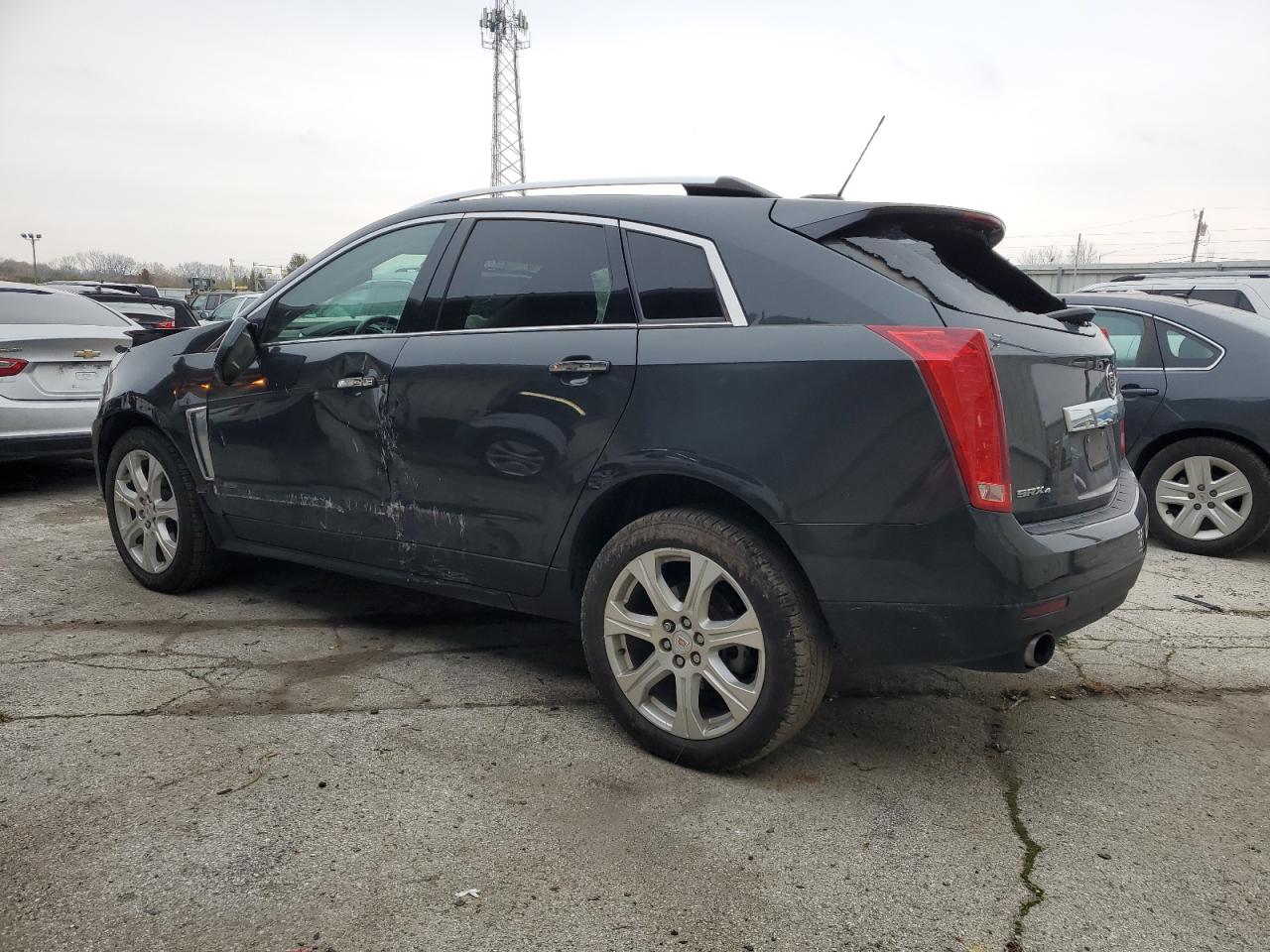 2015 Cadillac SRX VIN 3GYFNFE32FS528992 Copart auction photo, front end / all over damage thumbnail 2