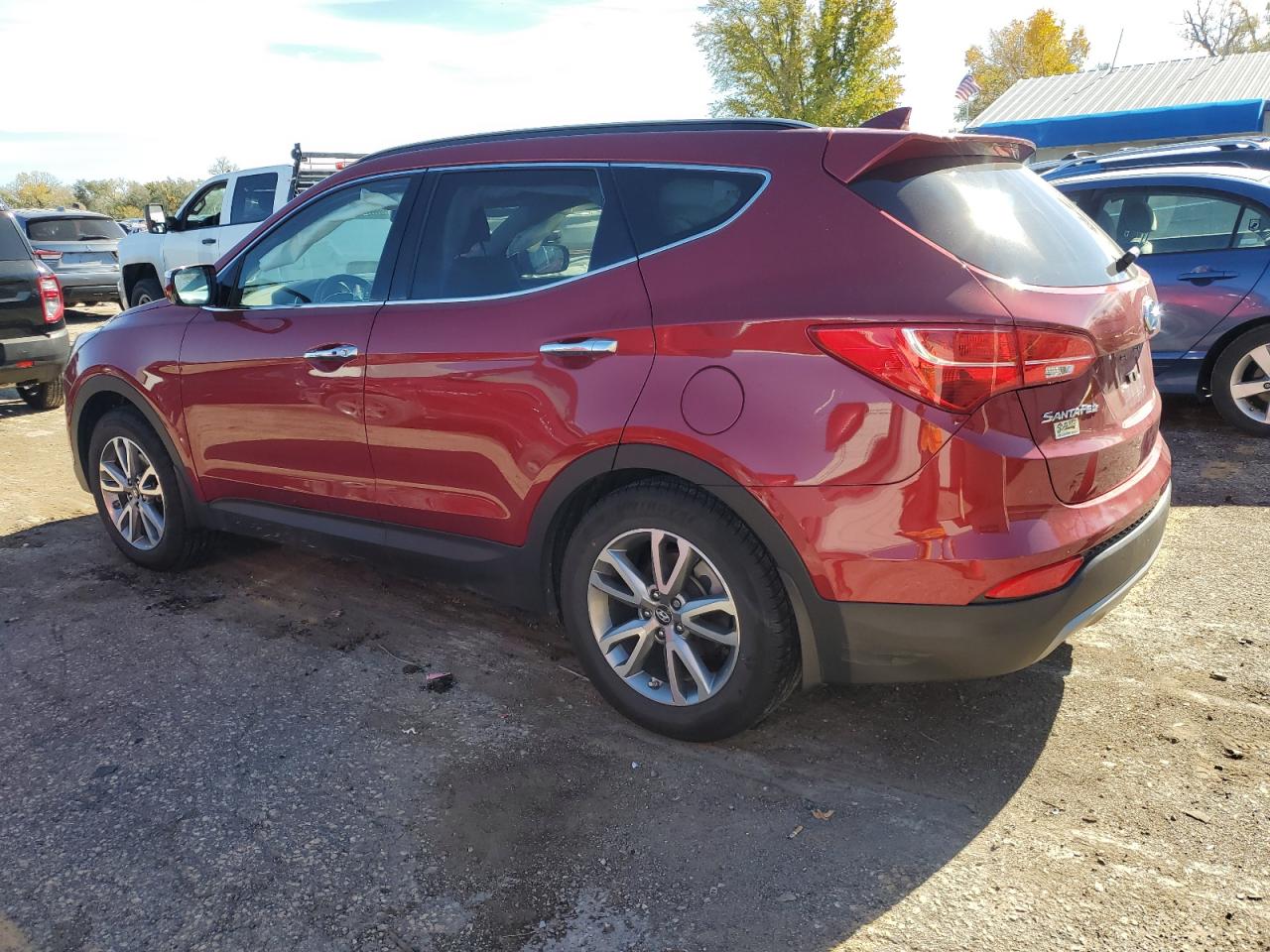 2014 Hyundai Santa Fe VIN 5XYZU3LA1EG169771 Copart auction photo, all over damage thumbnail 2