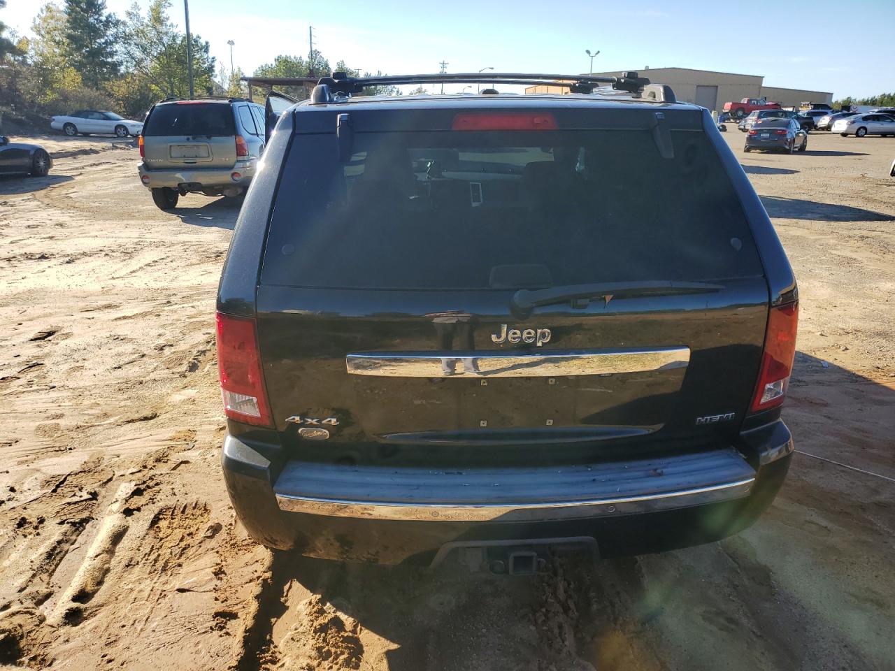 2009 Jeep Grand Cherokee VIN 1J8HR68T19C550936 Copart auction photo, all over damage thumbnail 6