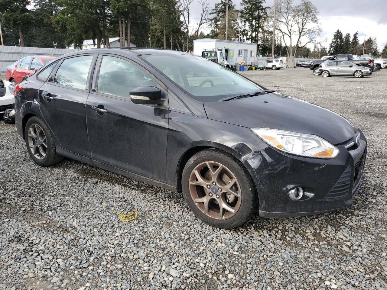 2013 Ford Focus VIN 1FADP3F2XDL139120 Copart auction photo, side / front end damage thumbnail 4