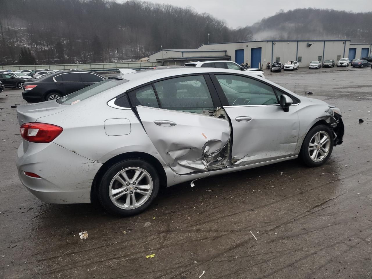 2016 Chevrolet Cruze VIN 1G1BE5SM5G7257141 Copart auction photo, side / front end damage thumbnail 3