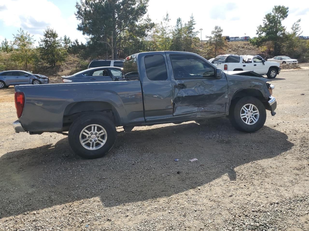 2009 GMC Canyon VIN 1GTDT19E698142512 Copart auction photo, front end / side damage thumbnail 3