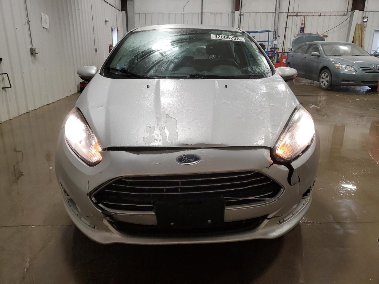 2016 Ford Fiesta VIN 3FADP4EJ6GM165537 Copart auction photo, front end damage thumbnail 5