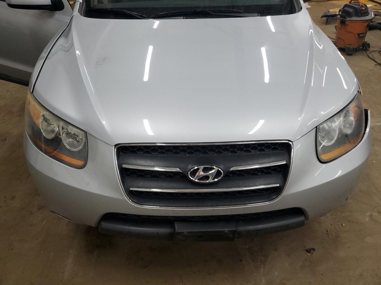 2009 Hyundai Santa Fe VIN 5NMSH13E69H299084 Copart auction photo, front end damage thumbnail 12