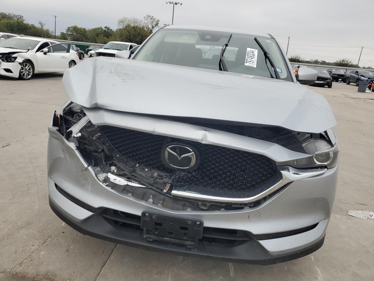 2018 Mazda CX-5 VIN JM3KFACMXJ0360901 Copart auction photo, front end / rear end damage thumbnail 5