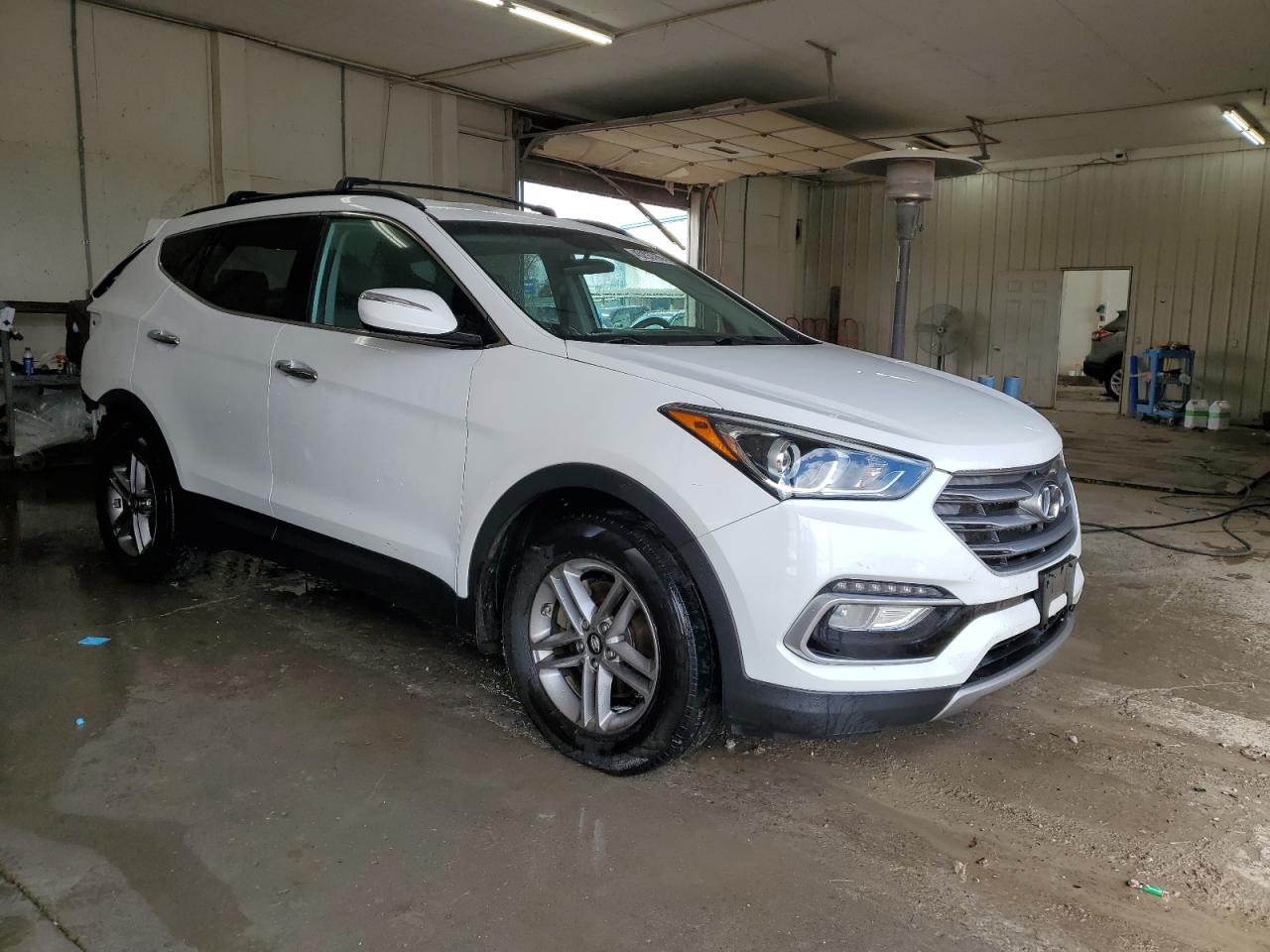 2017 Hyundai Santa Fe VIN 5NMZUDLB0HH021622 Copart auction photo, rear end / minor dent/scratches damage thumbnail 4