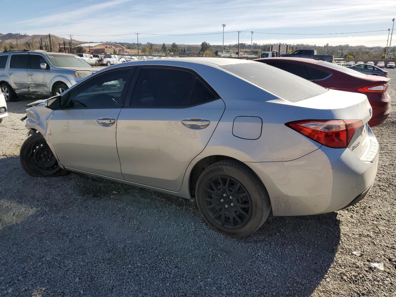 2017 Toyota Corolla VIN 5YFBURHE2HP693561 Copart auction photo, front end / side damage thumbnail 2
