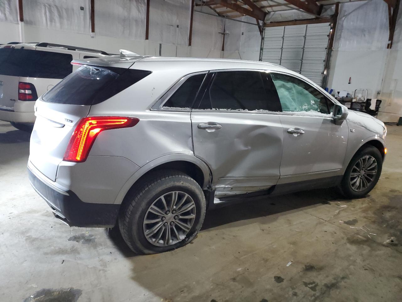 2019 Cadillac XT5 VIN 1GYKNCRS4KZ240984 Copart auction photo, side damage thumbnail 3