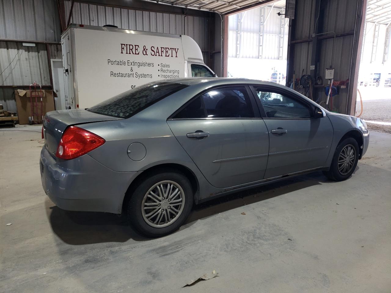 2007 Pontiac G6 VIN 1G2ZF58B474275113 Copart auction photo, rear end / minor dent/scratches damage thumbnail 3