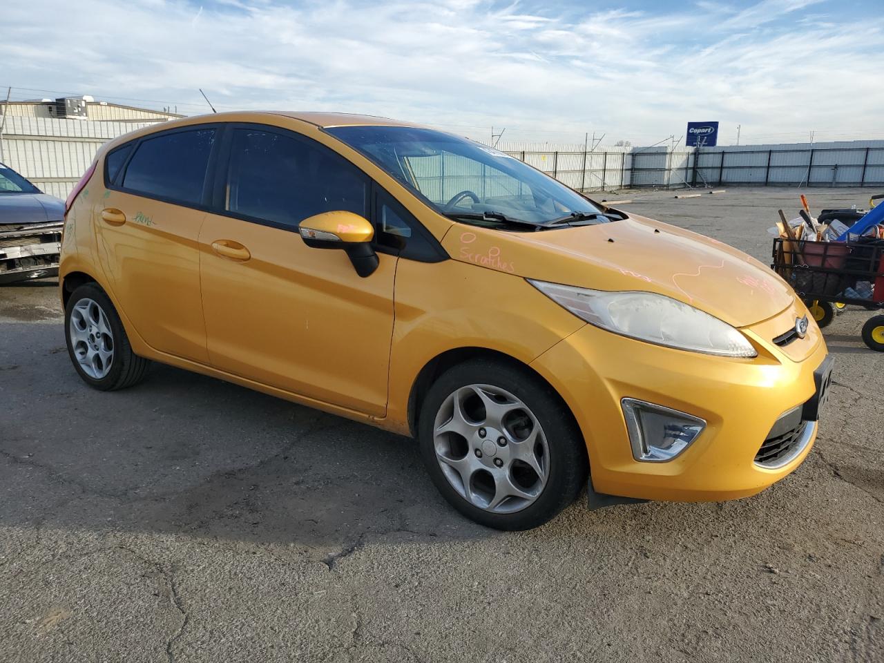 2011 Ford Fiesta VIN 3FADP4FJ1BM154503 Copart auction photo, rear end / minor dent/scratches damage thumbnail 4