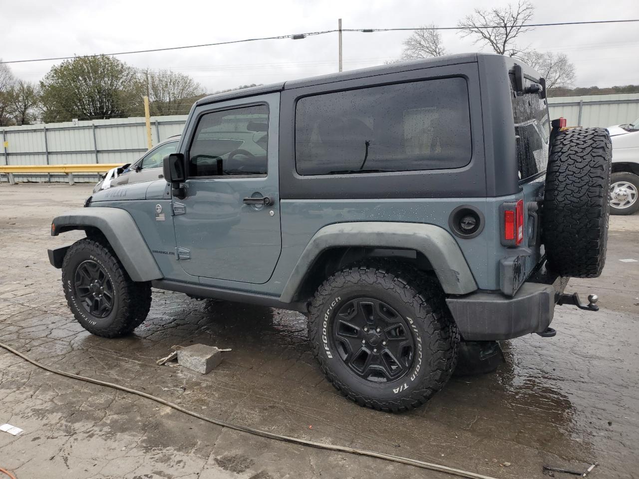 2015 Jeep Wrangler VIN 1C4AJWAG7FL575817 Copart auction photo, side damage thumbnail 2