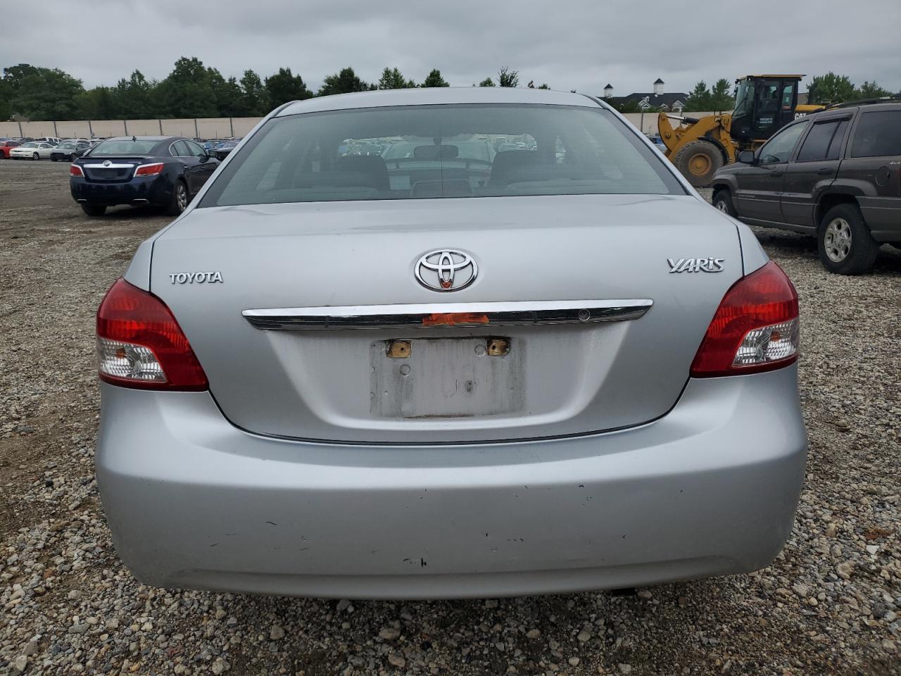 2009 Toyota Yaris VIN JTDBT903291300449 Copart auction photo, side / minor dent/scratches damage thumbnail 6