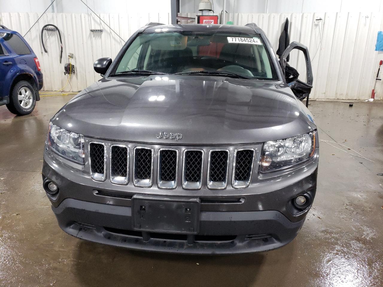 2014 Jeep Compass VIN 1C4NJDBB8ED828287 Copart auction photo, side / front end damage thumbnail 5