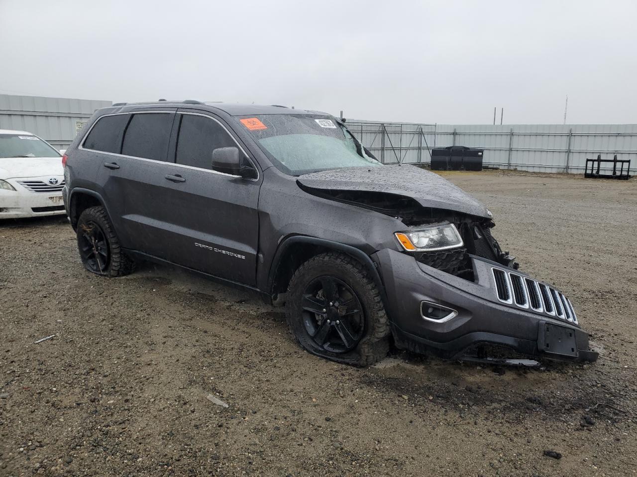 2016 Jeep Grand Cherokee VIN 1C4RJFAG5GC462341 Copart auction photo, front end / side damage thumbnail 4