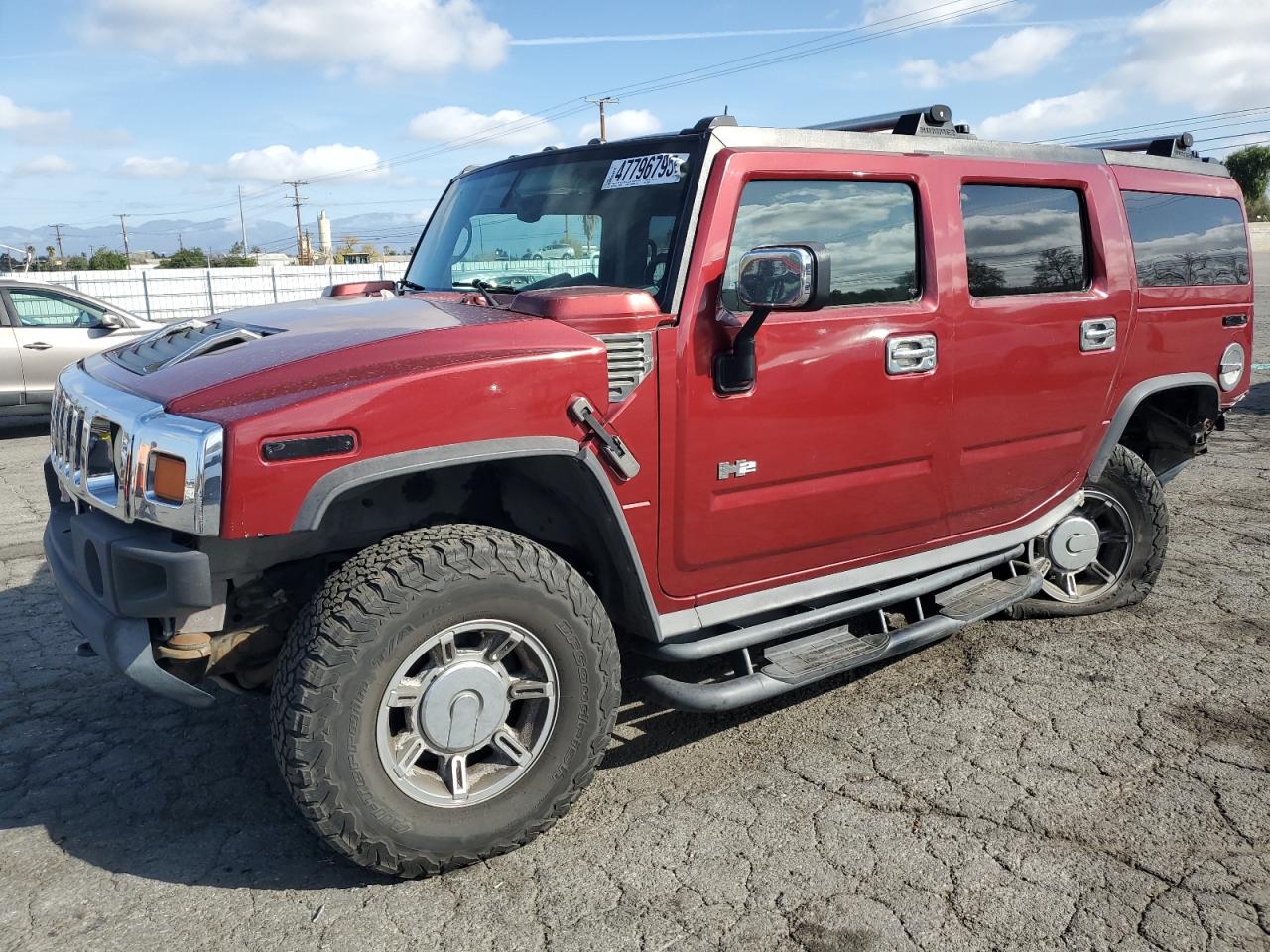 2003 Hummer H2 VIN 5GRGN23U73H128461 - Copart auction photo