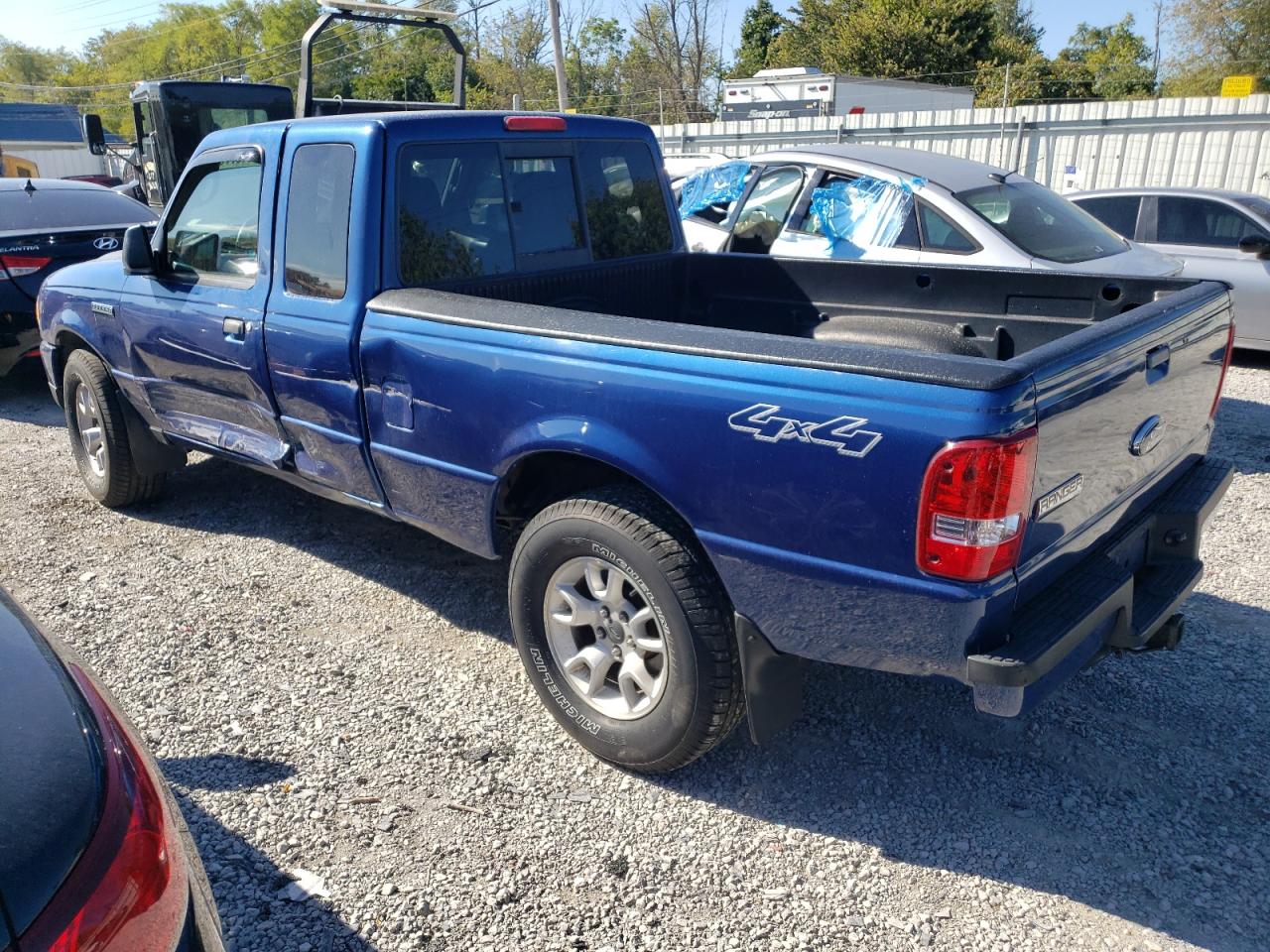 2011 Ford Ranger VIN 1FTLR4FE9BPA97142 Copart auction photo, side damage thumbnail 2