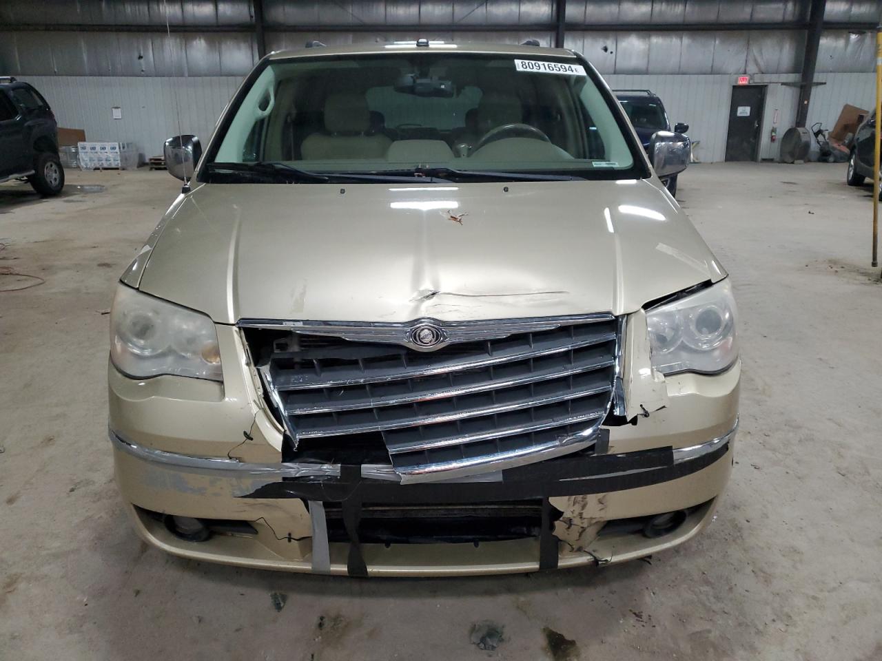 2010 Chrysler Town & Country VIN 2A4RR7DX0AR501792 Copart auction photo, front end damage thumbnail 5