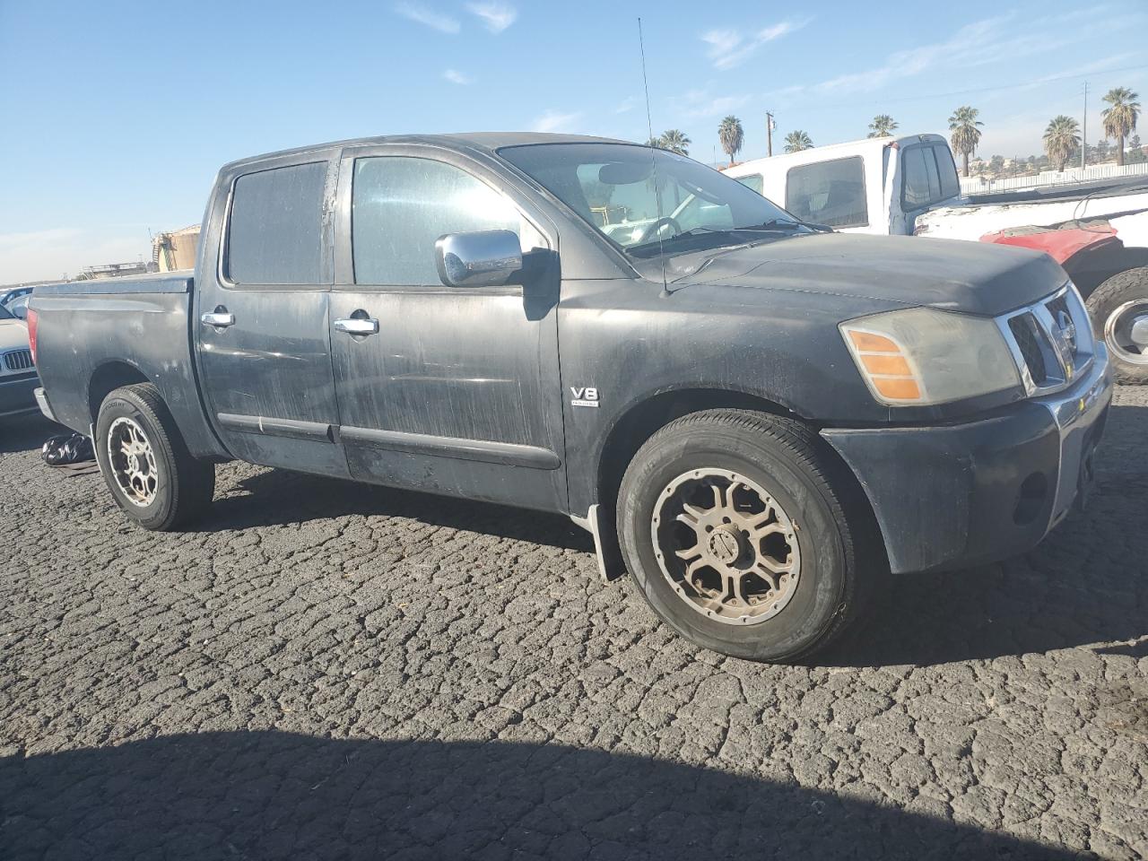 2004 Nissan Titan VIN 1N6AA07A64N584684 Copart auction photo, minor dent/scratches damage thumbnail 4